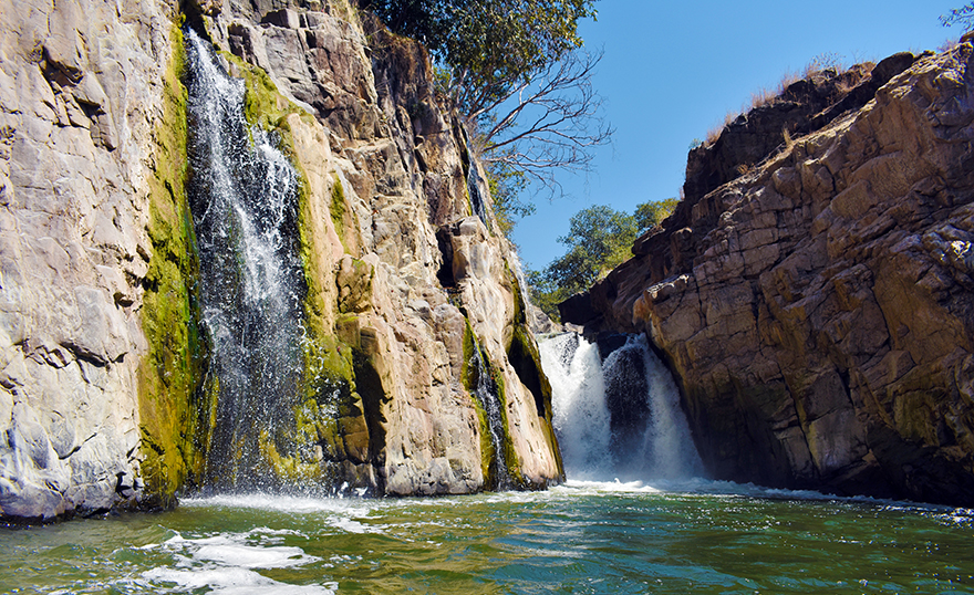 Experience the Thrill of Hogenakkal Falls: A Boat Ride Adventure Experience the Thrill of Hogenakkal Falls: A Boat Ride Adventure